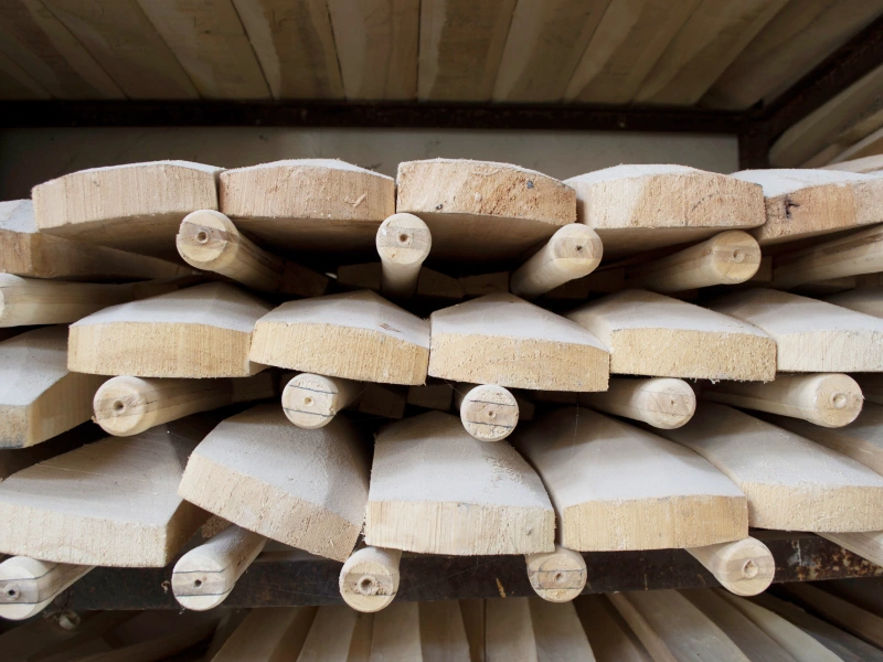 Raw English willow clefts showing natural colour variation before shaping.